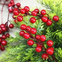 Umjetna stabljika iz crvenih bobica u jesenskom Božićnom dekoru za dom